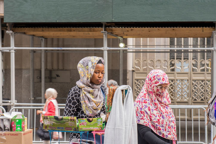 middle eastern women shopping in madison square garden, ny