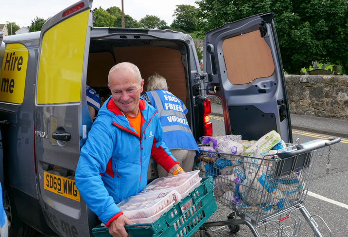 unloading donations from a van
