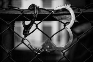 handcuffs on chainlink fence