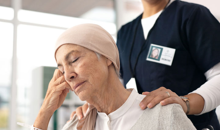 tired woman being given good care and support