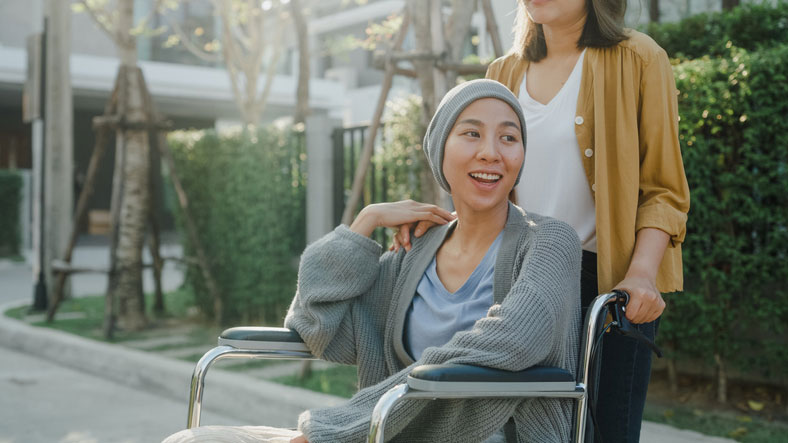cheerful woman in wheelchair