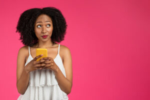 thoughtful woman with phone