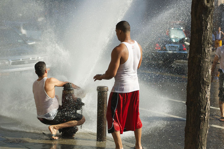 playing in fire hydrant water in new york