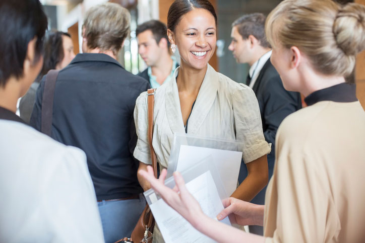 colleagues talking in lobby