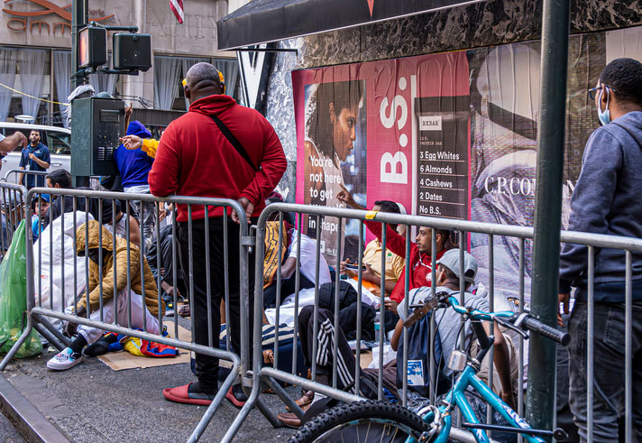 illegal immigrants on new york corner